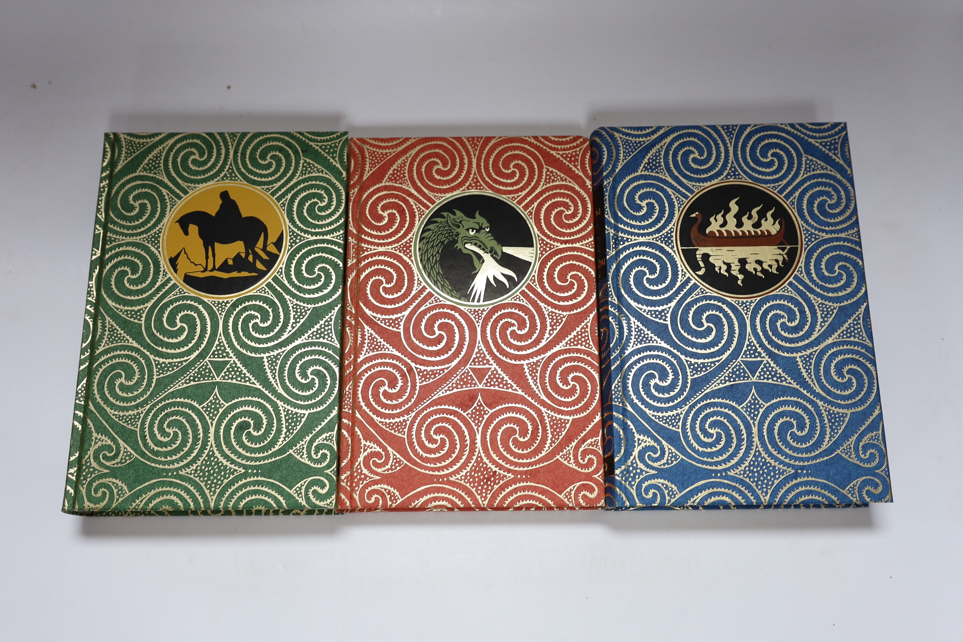 Folio Society - Tolkein's Lord of the Rings. 3 vols. illus (Grathmer & Fraser), decorated cloth and in the decorated box. 9th printing, 2002; together with (same author) The Hobbit. illus.; decorated cloth and slip case.